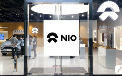NIO akcie a logo společnosti